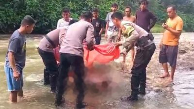 Polres Kotamobagu Evakuasi Korban Hanyut di Sungai Lobong
