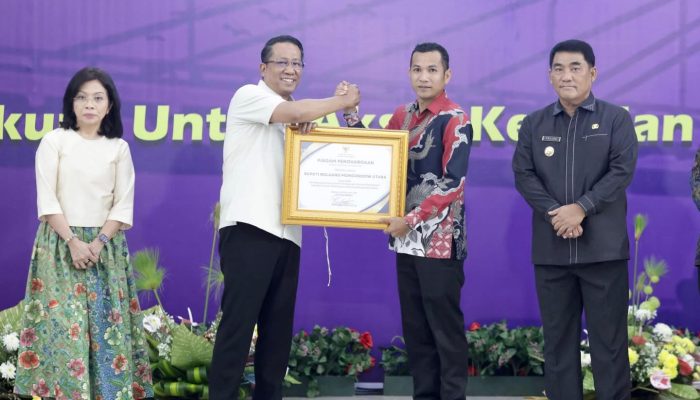 Wabup Bolmut Terima Penghargaan Posbankum Dari Kemenhum Republik Indonesia