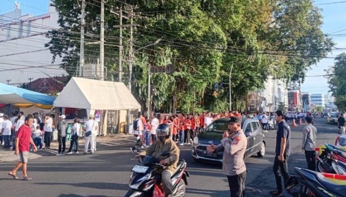Polsek Wenang Amankan Jalan Sehat GPDI Sambut Paskah, 550 Jemaat Ikuti Kegiatan dengan Aman dan Lancar