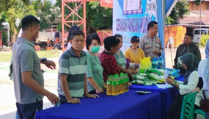 Polsek Tikala Amankan Kegiatan Gerakan Pangan Murah di Perkamil, Warga Antusias Serbu Sembako Terjangkau