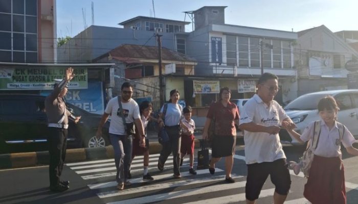 Optimalisasi Pos Cakalang Pagi, Polsek Malalayang Jaga Kelancaran Lalu Lintas di Kawasan Padat Aktivitas