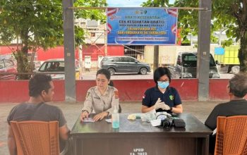 Peduli Kesehatan Buruh TPI, Polresta Manado Gelar Pemeriksaan dan Pengobatan Gratis