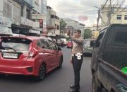 Pos Cakalang Sore, Polsek Wenang Hadirkan Kelancaran Arus Lalu Lintas di Jantung Kota Manado