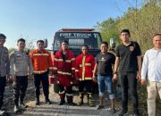 Polsek Malalayang Bersama Damkar Cepat Padamkan Kebakaran Alang-Alang di Lahan Reklamasi