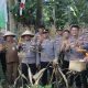 Program Swasembada Pangan, Polresta Manado Gelar Panen Jagung di Desa Sea