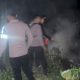 Cegah Kebakaran, Polsek Pineleng Padamkan Api di Lahan Pembakaran Sampah