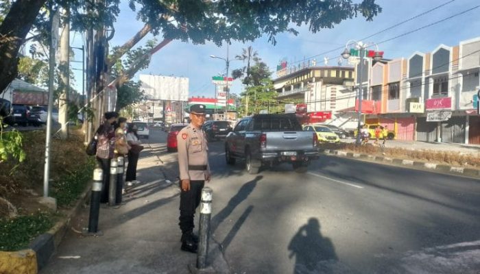 Pos Cakalang Polsek Mapanget Hadir di Jam Sibuk, Arus Lalu Lintas Tetap Lancar