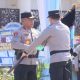 Brigjen Pol Yudo Hermanto Terima Pataka Maesa’an Waya dari Irjen Pol Roycke Harry Langie, Tandai Estafet Kepemimpinan Polda Sulut